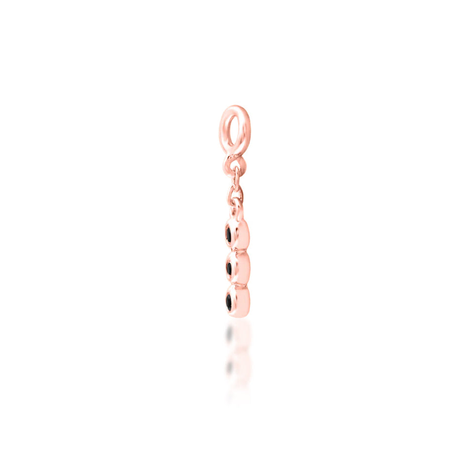 Front view of Junipurr Cohen charm in 14k rose gold with black cubic zirconia helix jewellery