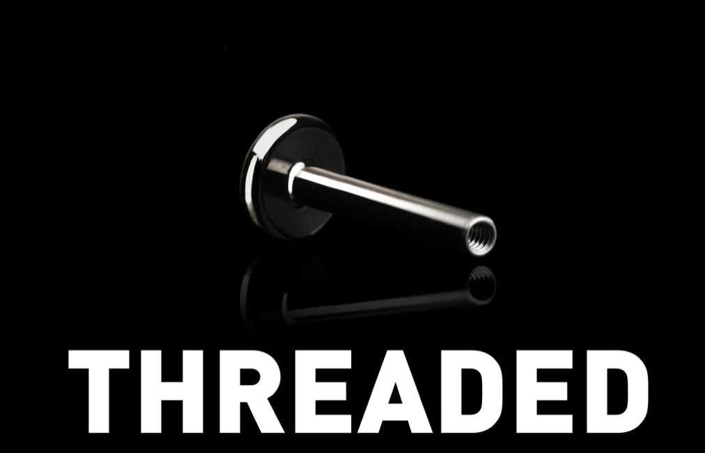 angled view of junipurr jewellery threaded titanium labret post showing flat back design