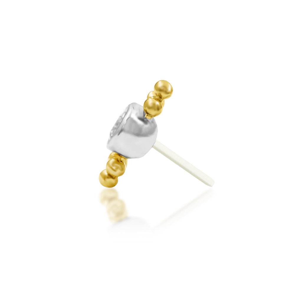 Side profile of Junipurr Jewellery Wit decorative end showing slim elongated silhouette