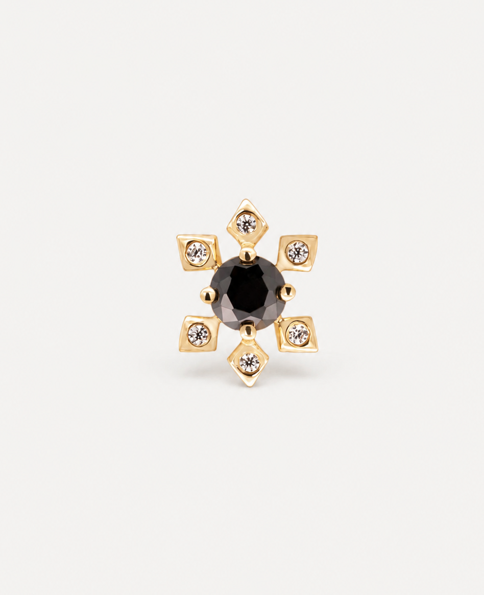 Junipurr Kamaria statement yellow gold piercing jewellery with a central black CZ surrounded by geometric white CZ details