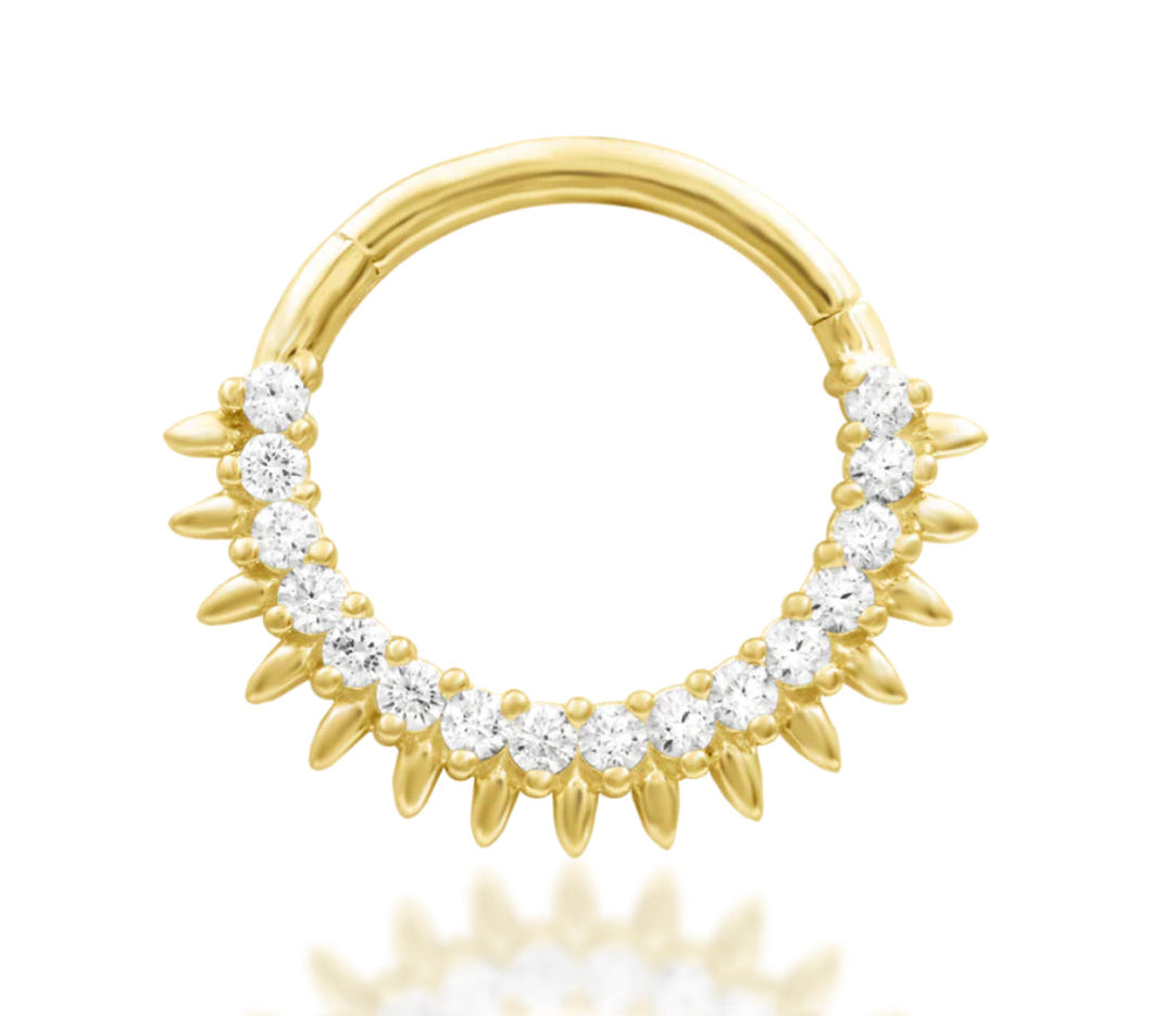 Junipurr Lovina 16g hinge segment ring in solid 14k gold, suitable for daith and septum piercings, with precision hinge and elegant design.