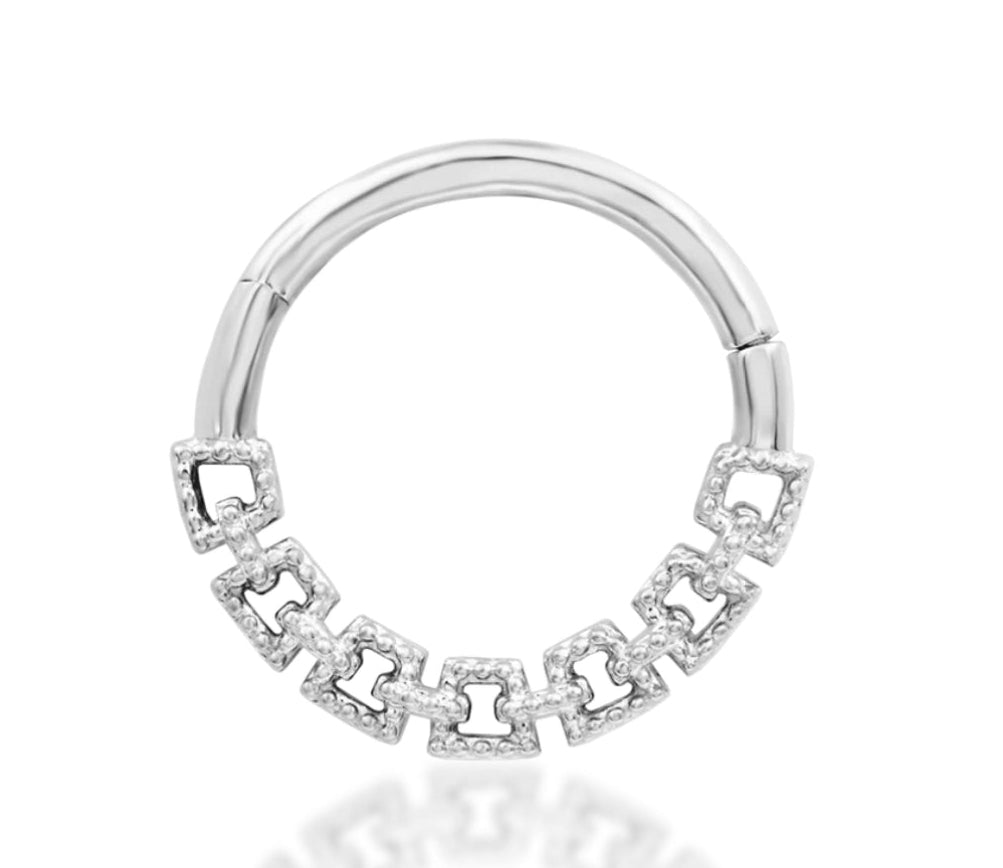 Junipurr Sasha 16g hinge segment ring in solid 14k gold, suitable for septum and daith piercings, featuring sculpted design and precision hinge for secure wear