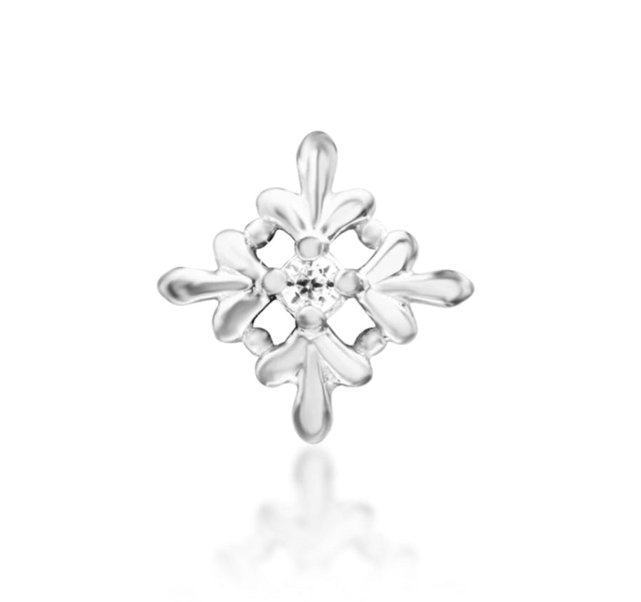 Junipurr Vira — a versatile threadless jewelry design crafted in premium 14k white gold. Featuring Vira adds a subtle yet striking sparkle to your lobe, helix, or conch piercings. Designed for effortless elegance, this piece complements both everyday and statement looks.