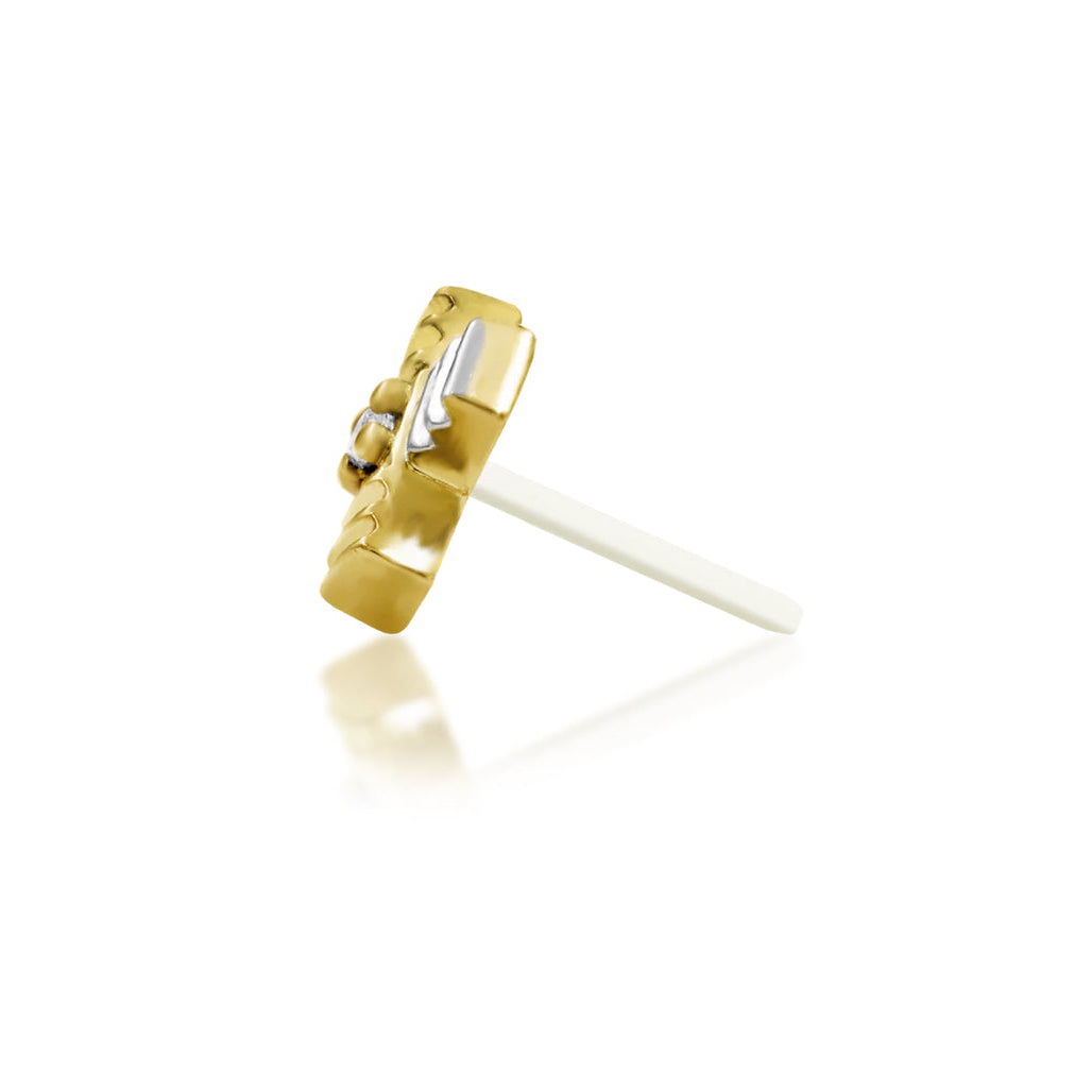 Mixed-metal piercing jewellery combining warm yellow gold and cool white gold