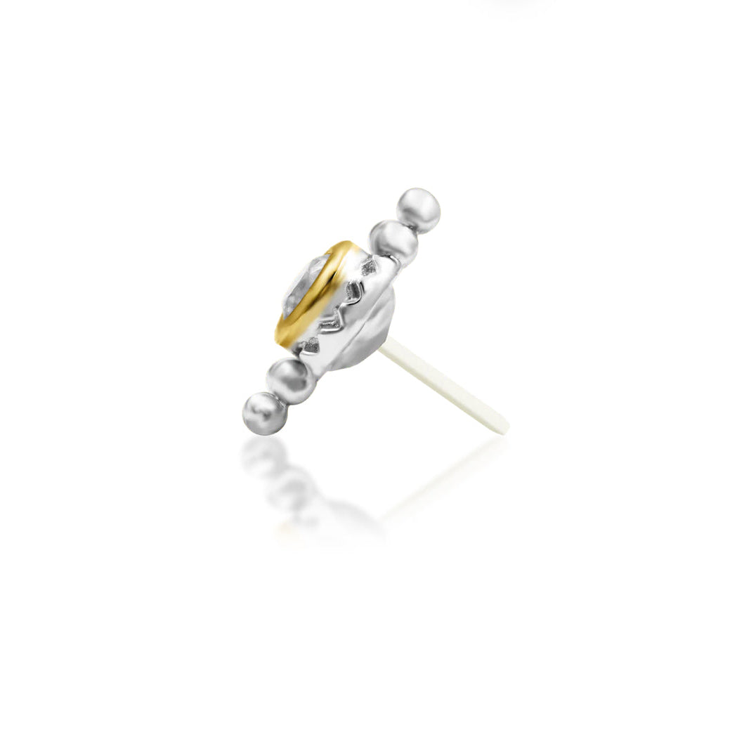     Solid 14k gold cartilage stud featuring a textured halo around a white gemstone
