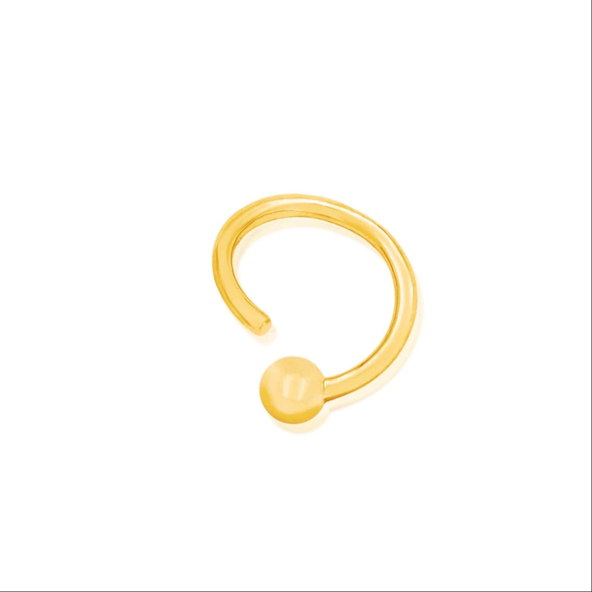 14k gold septum ring in yellow gold with a smooth fixed bead and seamless circular profile.