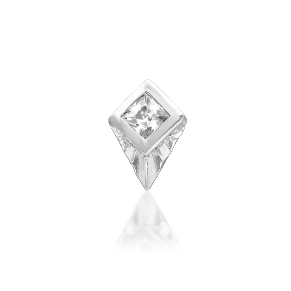     Close-up of a 2mm square white cubic zirconia in a polished gold setting