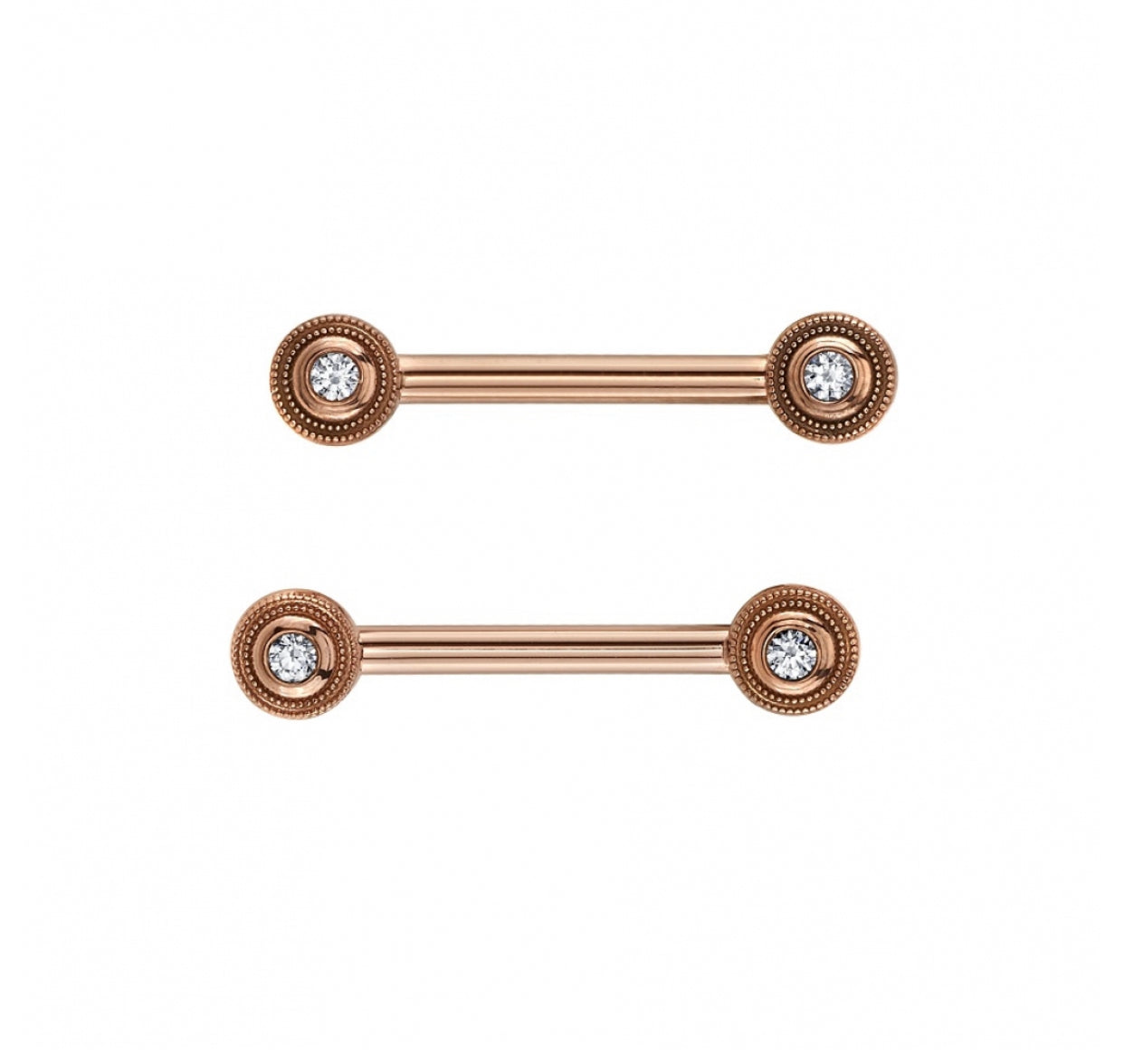 Angled detail of the BVLA millgrain bezel nipple bar showing decorative bezel edging in a bespoke gold design.
