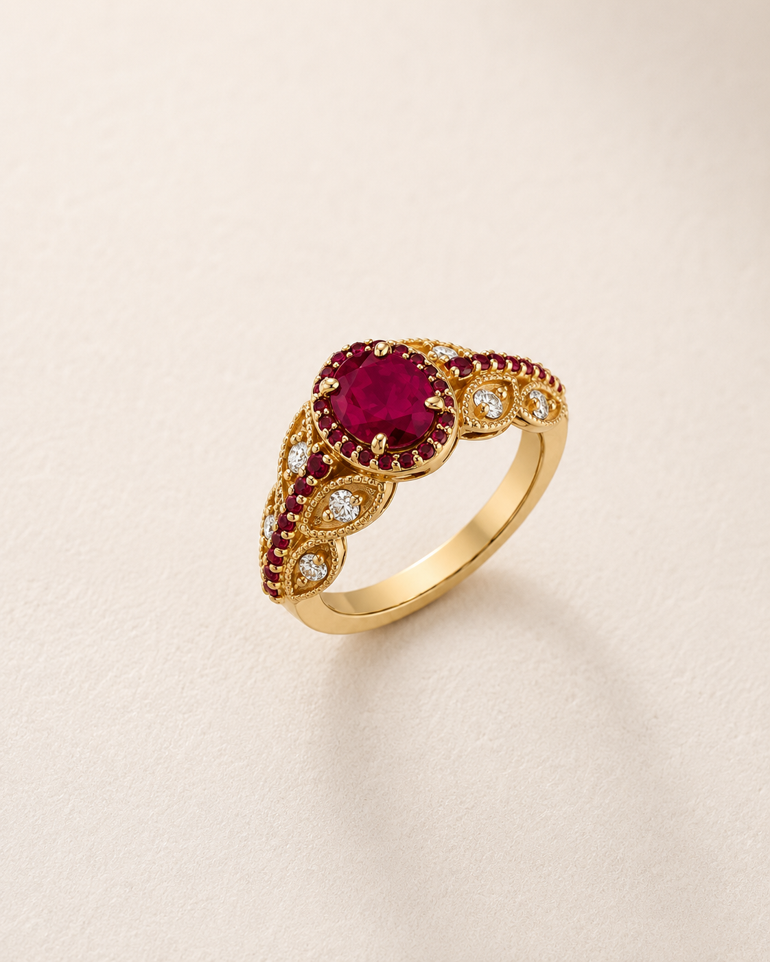 BVLA bespoke yellow gold engagement ring featuring an oval ruby with a ruby halo and diamond accented vintage inspired band in a handcrafted luxury custom design.