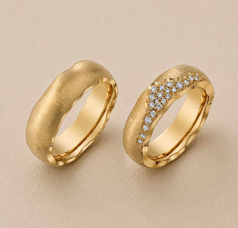 BVLA bespoke handmade gold wedding rings featuring brushed and diamond-set finishes, individually crafted luxury wedding bands.