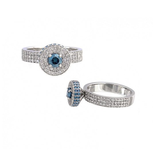 BVLA Elyssa bespoke halo ring in white gold with a round Ocean Blue Diamond centre, white diamond halo, blue diamond outer halo and triple-row white diamond band.