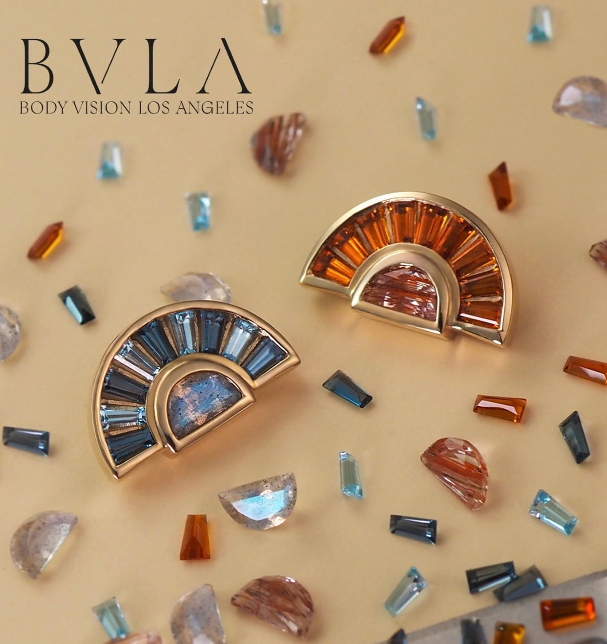 Two BVLA Masaki yellow gold body jewellery designs featuring Labradorite with London blue topaz and Swiss blue topaz, alongside Madeira citrine with copper rutilated quartz, displayed as handcrafted luxury gemstone body jewellery.