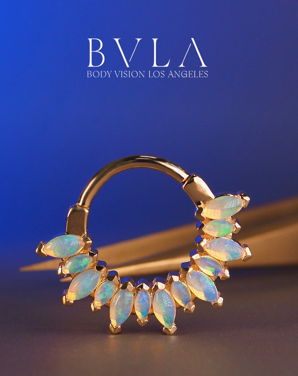BVLA Sweet Dreams in solid 14k yellow gold featuring a White Opal centre for luxury helix, flat, conch, tragus and lobe piercings.