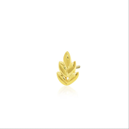 Solid 14k yellow gold leafy stud adding subtle organic detail to an upper-ear piercing.