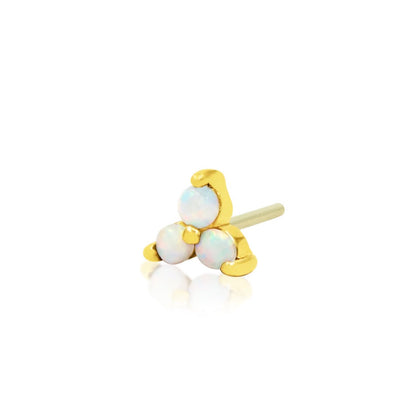 Yellow gold cartilage earring with a three-stone synthetic opal cluster.