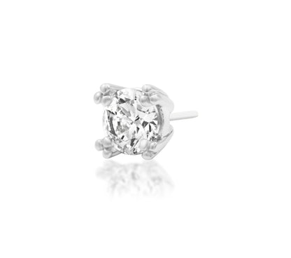 Angled perspective of the Junipurr Jewellery Beaded Prong in white gold highlighting prong-set CZ design.
