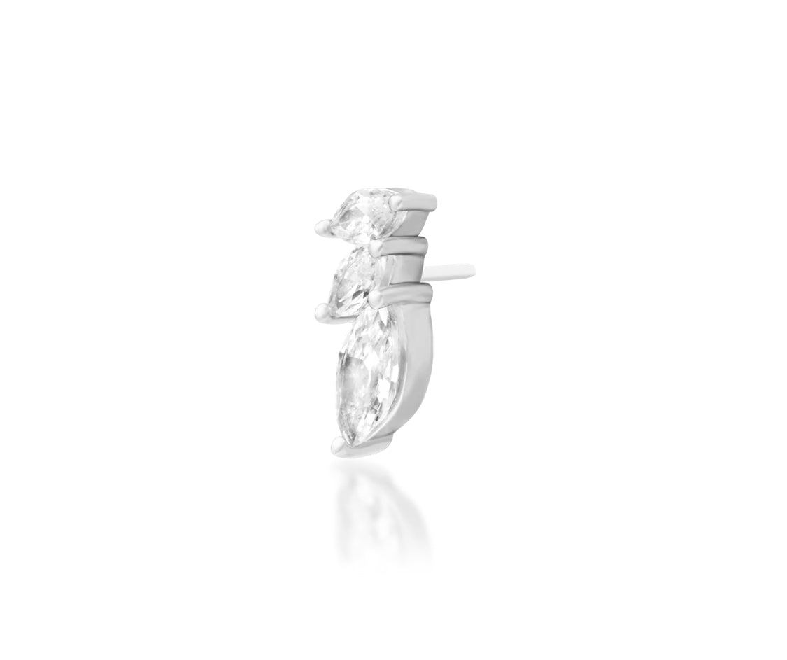 Angled perspective of the Junipurr Jewellery Enigma in white gold showing clean lines and stone placement.
