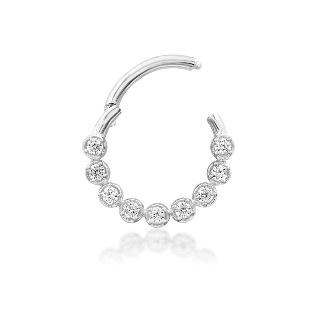 Angled view of Junipurr Aziza solid 14k white gold clicker ring with white cubic zirconia.