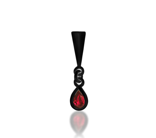 Close-up of the Junipurr Blood Drip Stake Threadless End in Rhodium Black Gold with a pear-shaped Garnet CZ dangle, showcasing its dark, elegant design perfect for helix, lobe, or conch piercings.