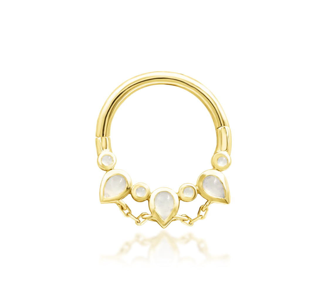 angled perspective of junipurr catalina moonstone clicker ring showing smooth hinge design