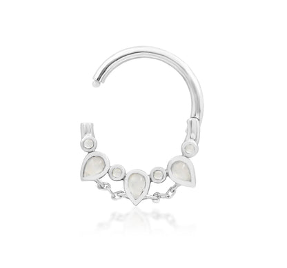 off front angled view of junipurr catalina white gold moonstone clicker ring for refined piercing styling