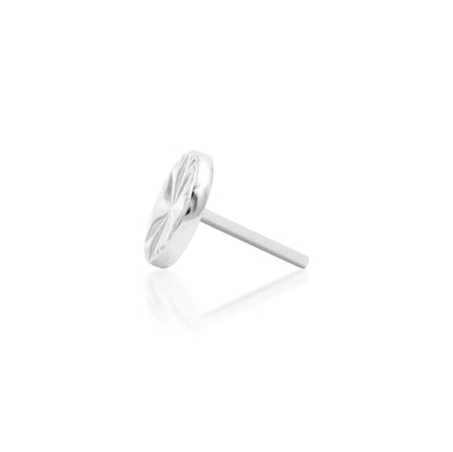 Side profile of the Junipurr Engraved Disk white gold piercing stud, showing the polished decorative top and threadless pin.