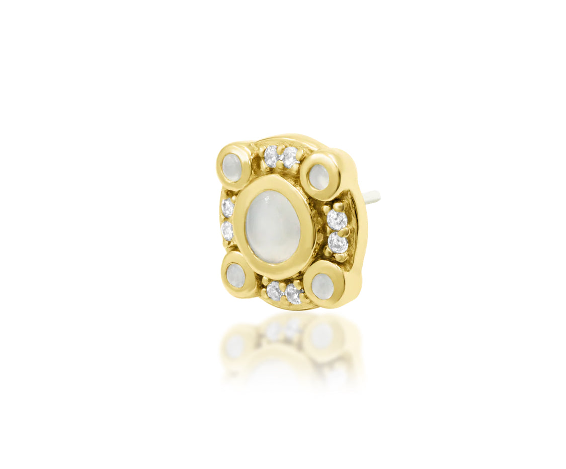 angled perspective of junipurr inaya threadless end showing moonstone centre with surrounding cubic zirconia accents