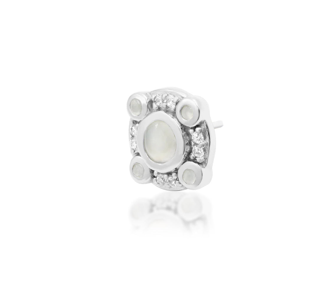 off front angled perspective of junipurr inaya white gold threadless end showing refined gemstone arrangement