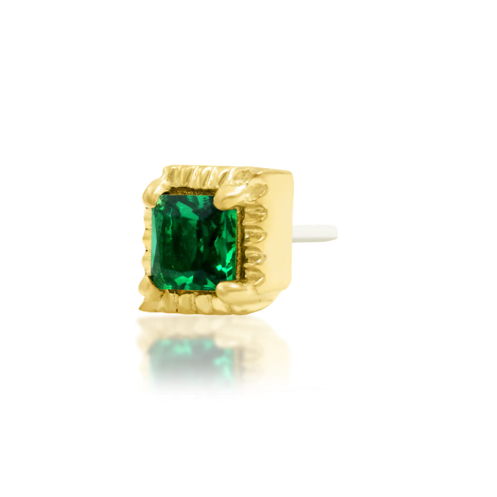 Off front angled view of Junipurr Jewellery Arden highlighting emerald green CZ gemstone and refined gold setting