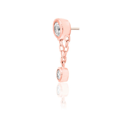 Angled perspective of Junipurr Jewellery Cora rose gold threadless decorative end designed for curated ear styling