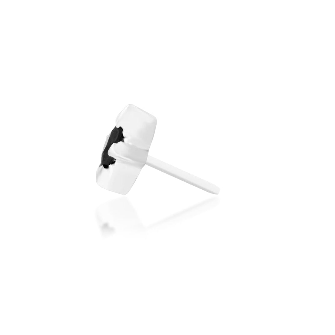 Angled view of Junipurr Jewellery Corvin black cubic zirconia threadless decorative end in white gold