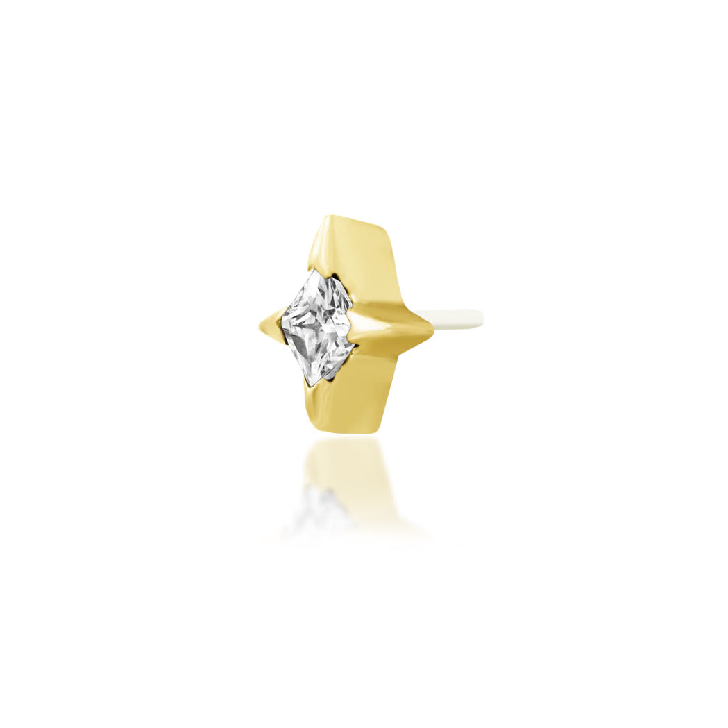 Angled view of Junipurr Jewellery Corvin white cubic zirconia threadless decorative end in yellow gold