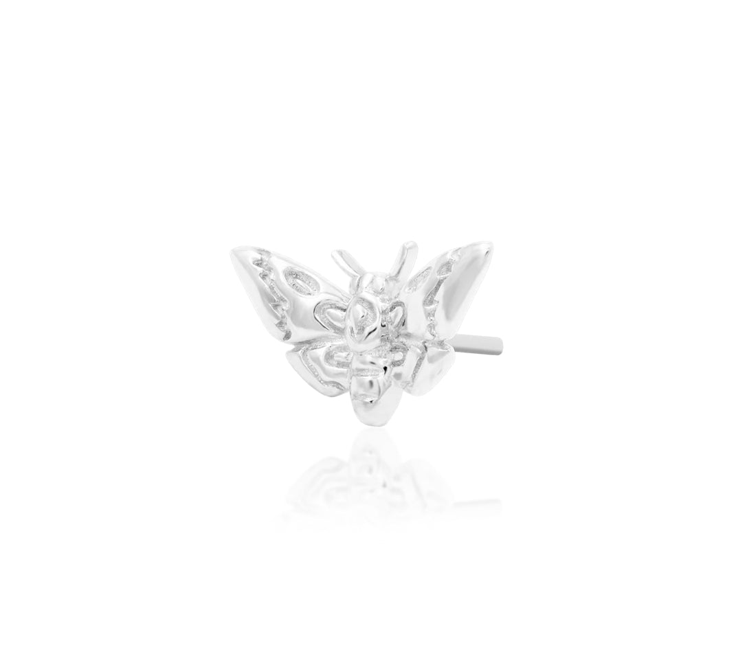 Angled perspective of Junipurr Jewellery Death Head Moth white gold threadless decorative end