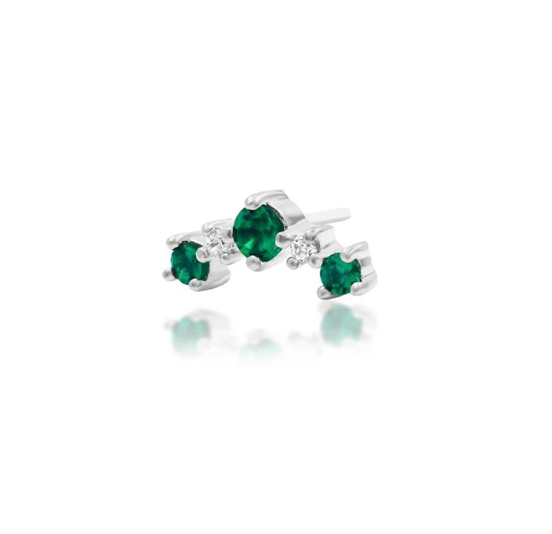 Angled perspective of Junipurr Jewellery Deaver emerald green CZ threadless end highlighting gemstone placement
