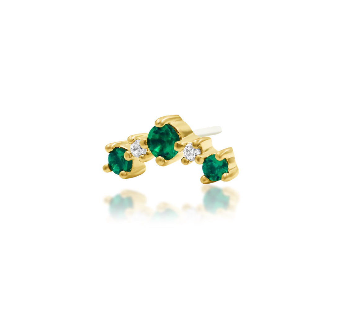 Off front angled view of Junipurr Jewellery Deaver threadless end showing elongated emerald green CZ gemstone arrangement
