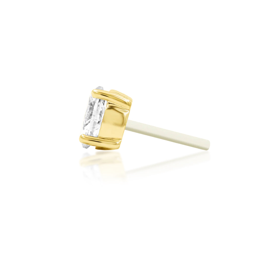 Full side profile of the Junipurr Jewellery Diamond Oval threadless diamond end in 14k yellow gold suitable for cartilage piercings.