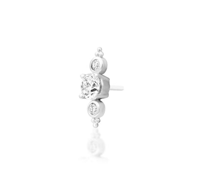 Angled view of the Junipurr Jewellery Elated 14k white gold threadless decorative end featuring lab-grown diamond detailing.