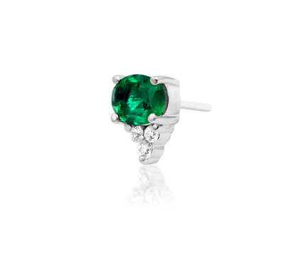Angled perspective of Junipurr Jewellery Fahey emerald green CZ threadless end highlighting gemstone setting