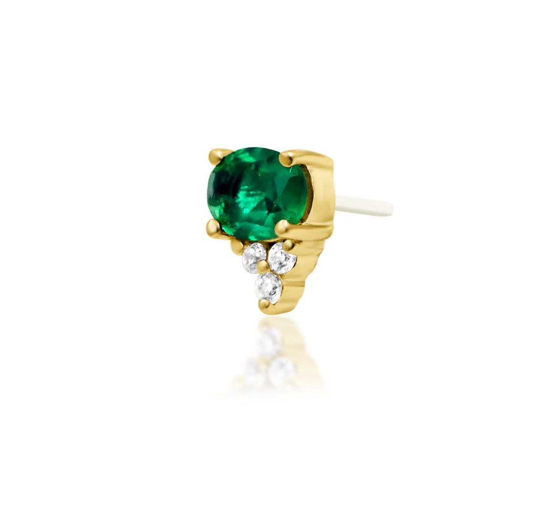 Off front angled view of Junipurr Jewellery Fahey threadless end showing emerald green CZ centre stone with accent gemstones