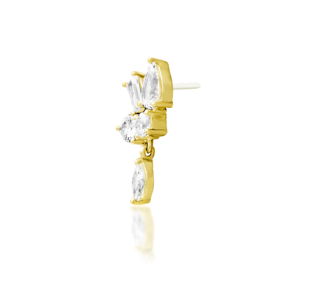 Off front angled view of Junipurr Jewellery Farah threadless end in yellow gold showing sculptural CZ arrangement and elongated silhouette
