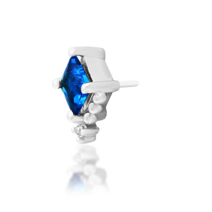 Off-angle perspective of Junipurr Jewellery Hesper sapphire blue CZ cartilage jewellery