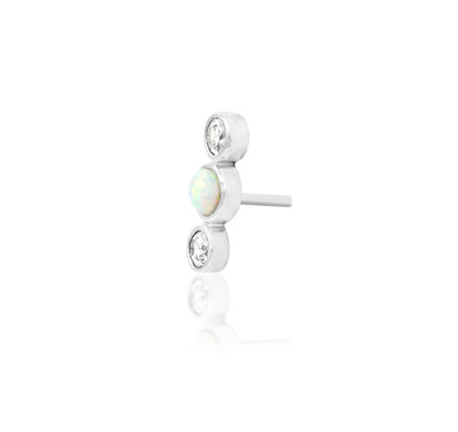 Off front angled view of the Junipurr Jewellery Nani in white gold showing polished triple bezel stone setting.