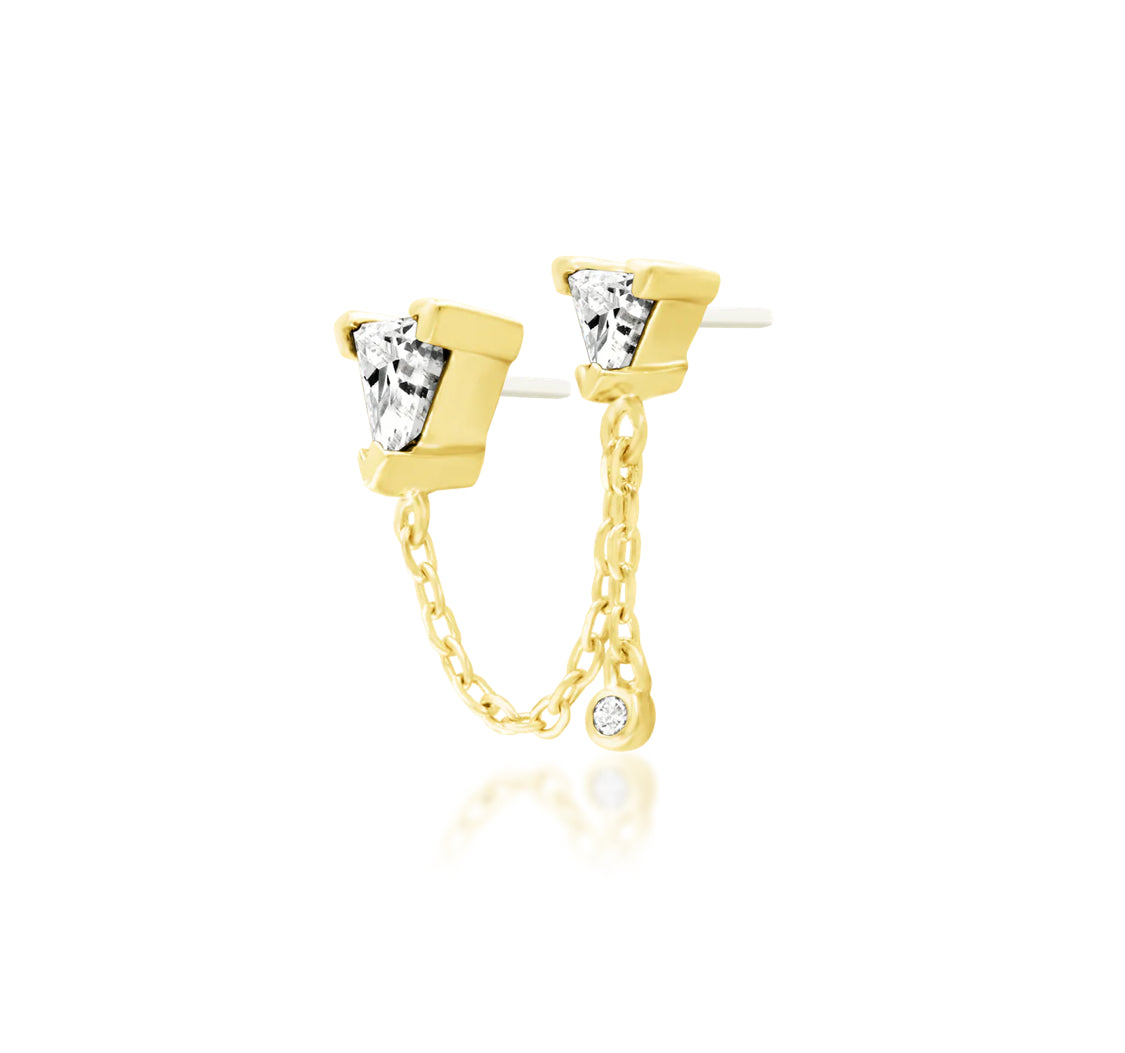 Off front angled view of the Junipurr Jewellery Nessa in yellow gold highlighting triangle cut white CZ stones and connecting chain.