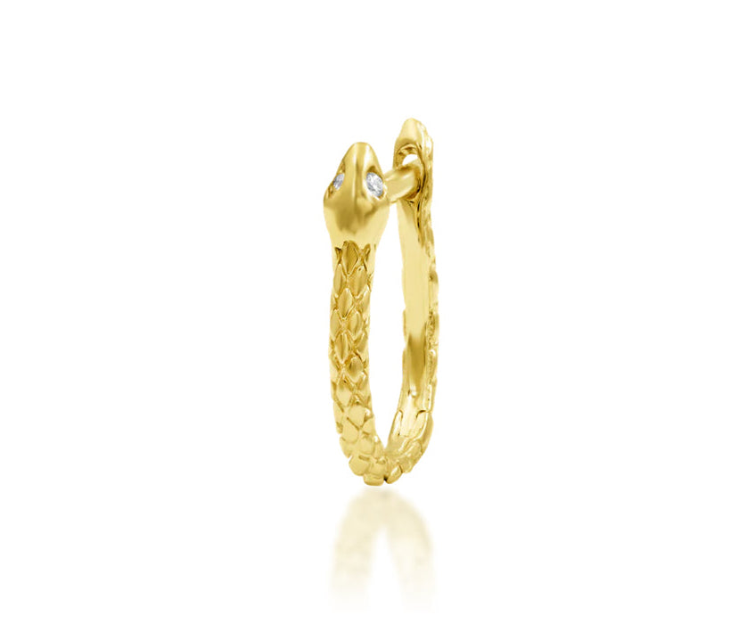 Side profile of the Junipurr Jewellery Ophis 14k yellow gold clicker ring designed for daith wear.
