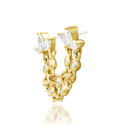 Junipurr Munira 14k yellow gold marquise CZ chain threadless end angled view with cascading gemstone movement for curated ear styling