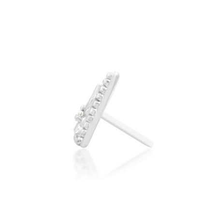 Side profile of a white gold threadless decorative end.