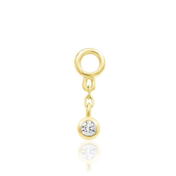 Yellow gold chain charm with bezel-set CZ.