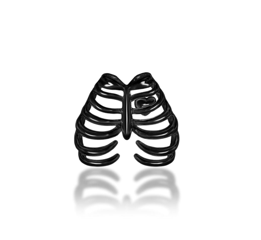 Close-up of the Junipurr Rib Cage Threadless End in Rhodium Black Gold, showcasing its hand-crafted 3D rib cage design — perfect for helix, lobe, or conch piercings.