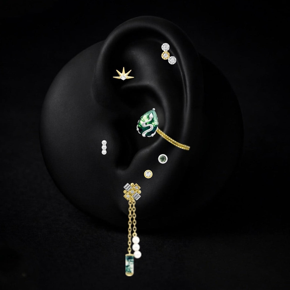 Miss Agate botanical serpent curated ear featuring gold piercing jewellery with organic botanical and serpent inspired designs