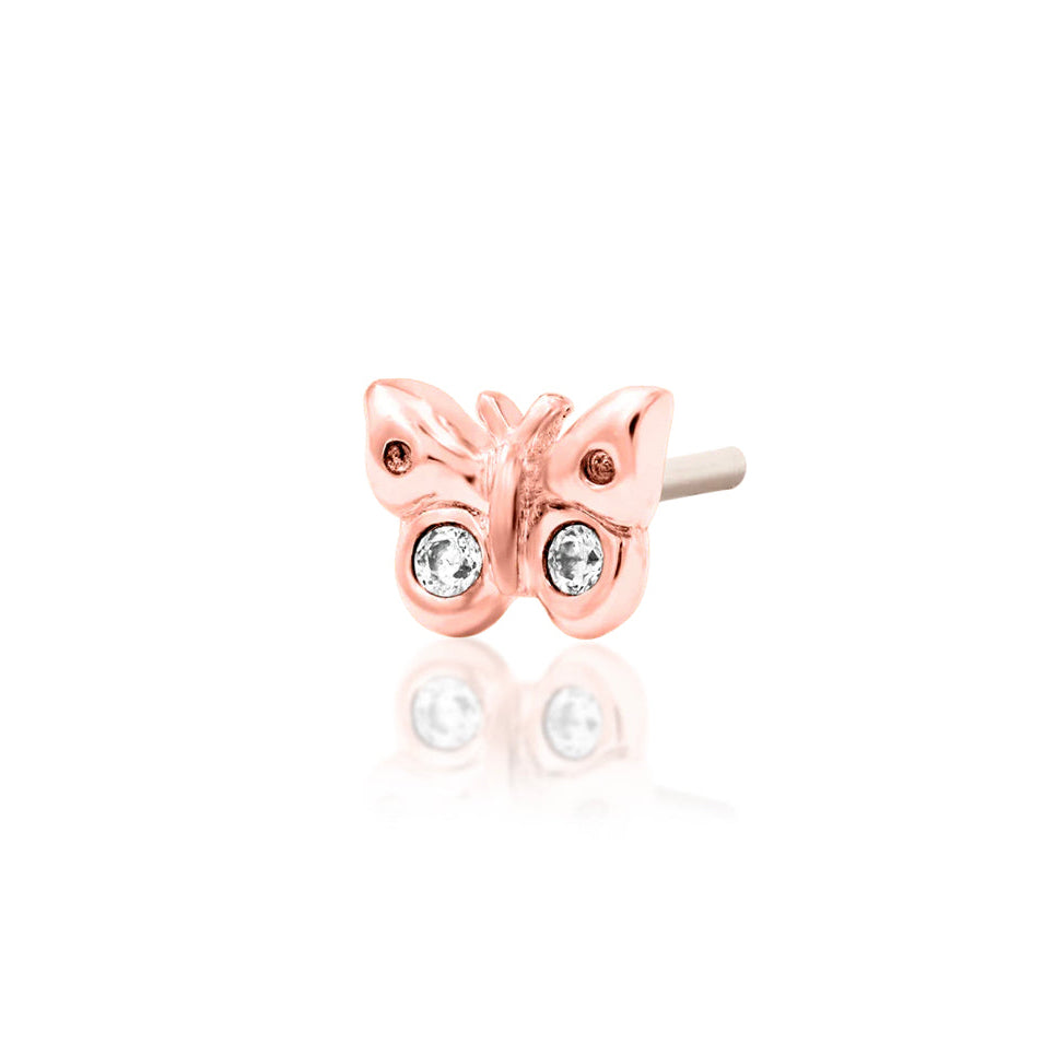 Rose gold butterfly cartilage jewellery for minimalist curated ears.